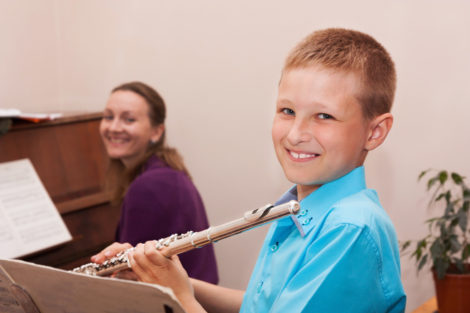 Boy Taking Flute Lessons